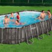 Piscina Desmontable Tubular Power Steel Oval Diseño Madera 6,10x3,66x1,22 m con Depuradora de arena 5.678 L/H